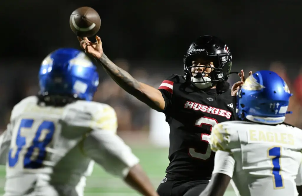 Centennial quarterback Jaden Jefferson (3) passes over Santa Margarita defensive...