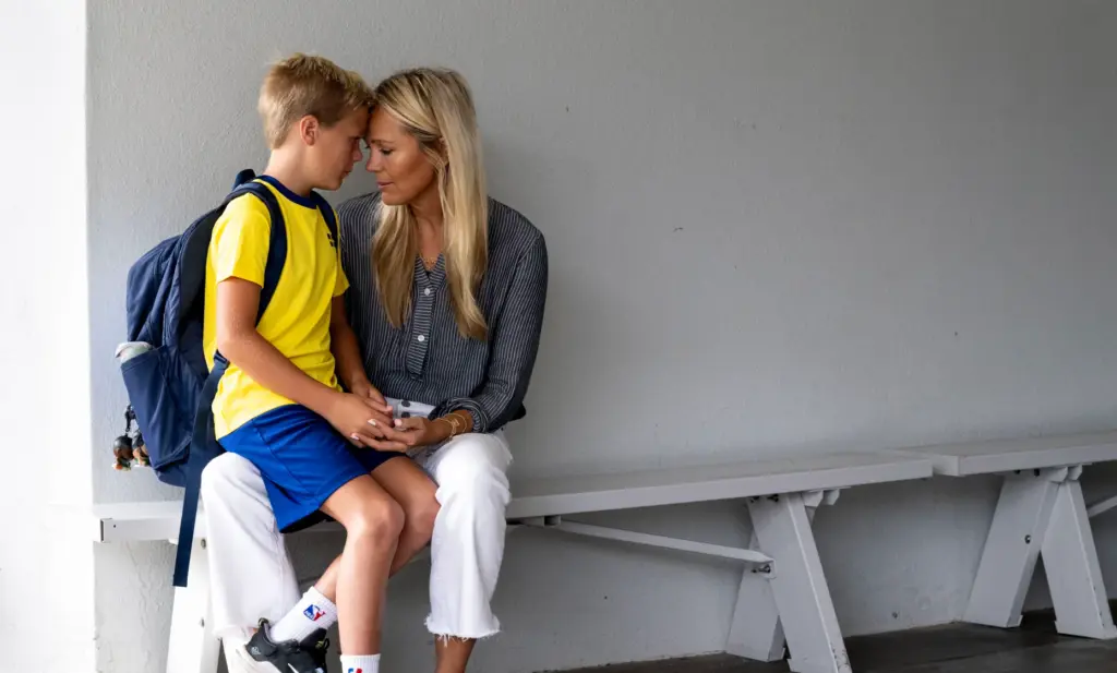 Hugo Dickens takes a moment with his mom Sofia on...