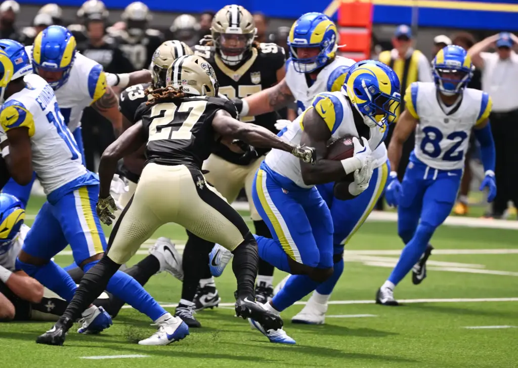 Rams running back Jordan Waters (32) runs for a first...