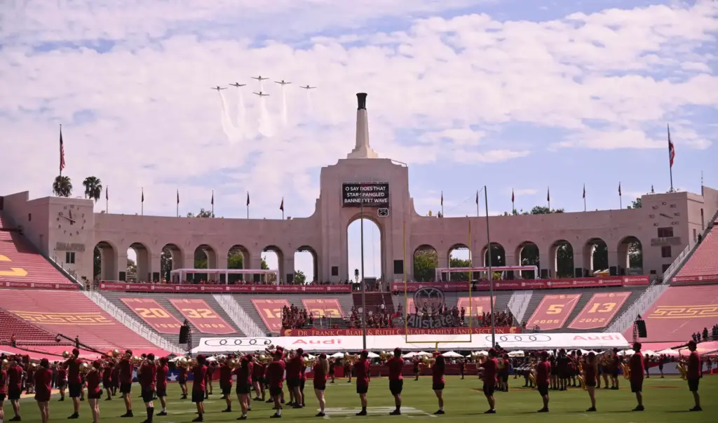 The USC Trojans bands performs the National with a flyover...