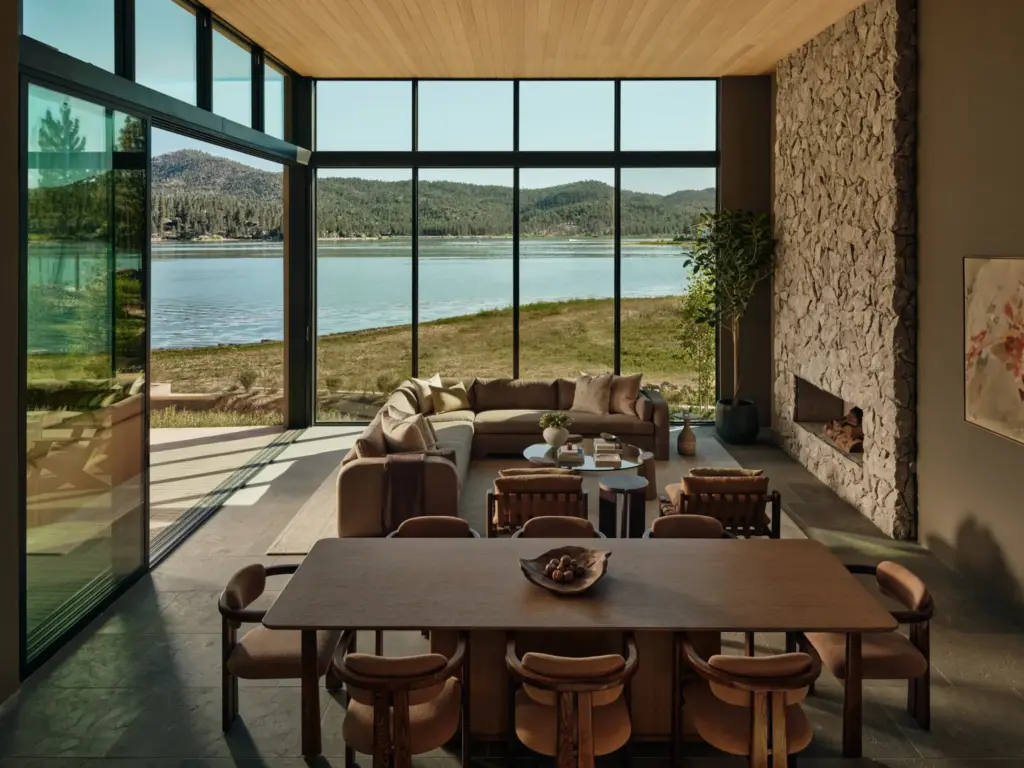 The great room has a floor-to-ceiling stone fireplace. (Photo by...