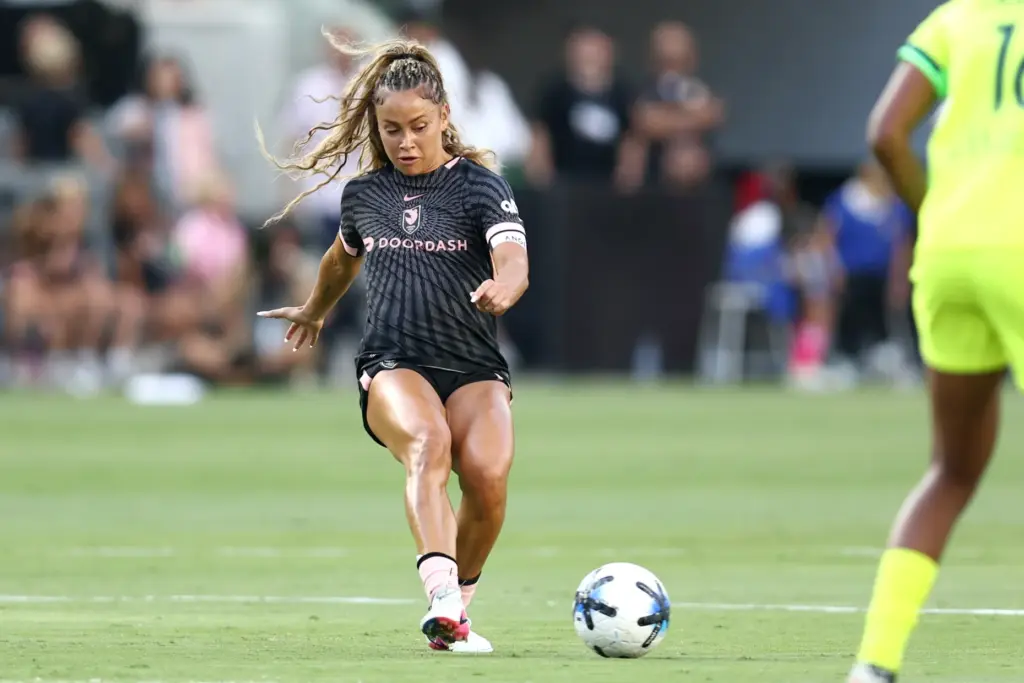 Angel City FC defender Sarah Gorden kicks the ball against...