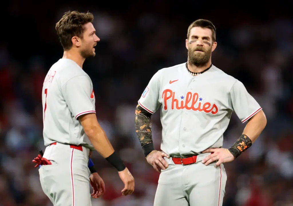 Philadelphia Phillies star Bryce Harper, right, and teammate Trea Turner...