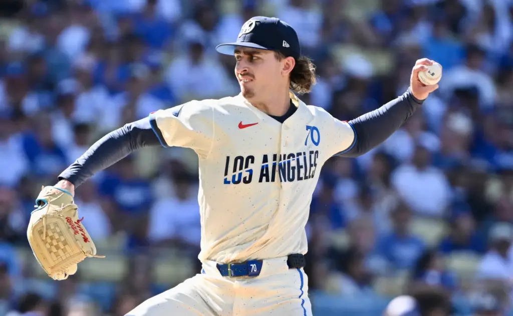 Justin Wrobleski of the Dodgers throws to the plate against...
