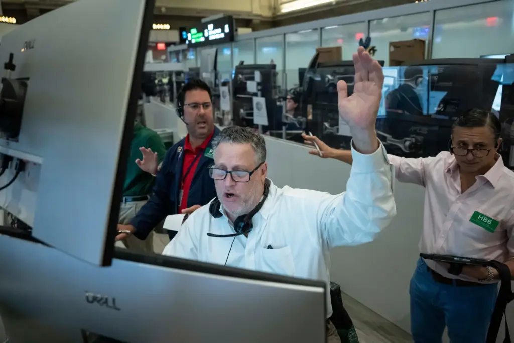 Options trader Marty Handler works on the floor of the...