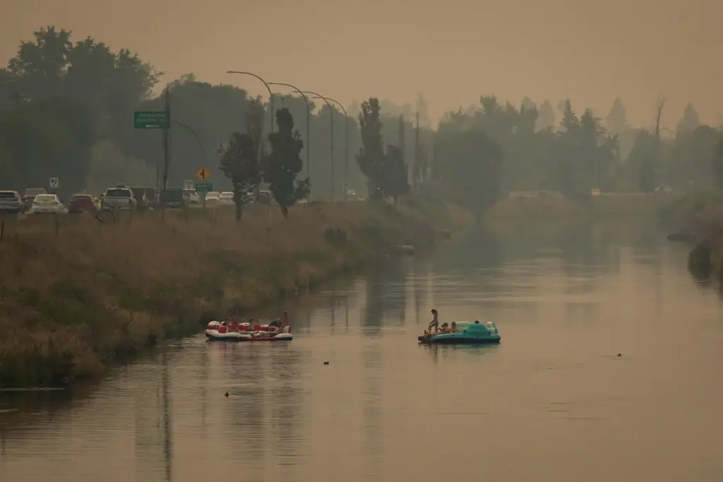 People float on the Channel Pathway that connects Okanagan Lake...