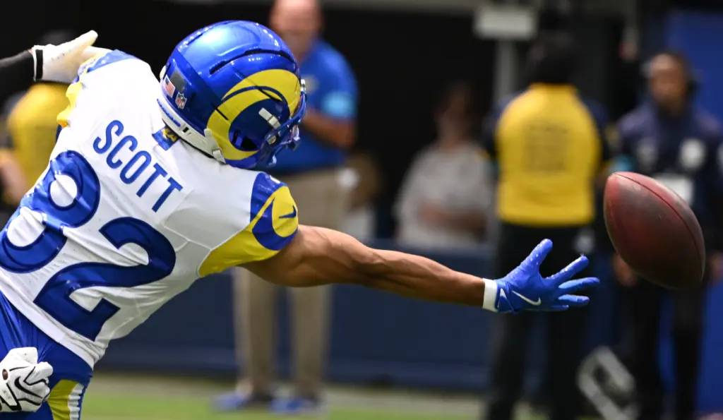 Rams wide receiver Tyler Scott (82) canât reach a pass...