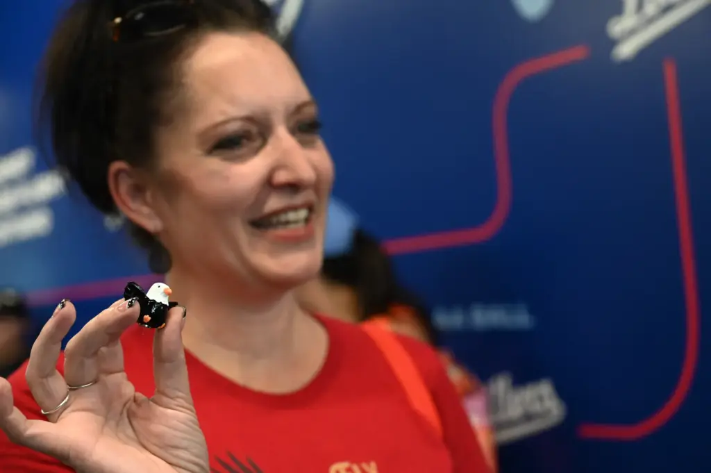 Corona resident, Stephanie Gotts, shows a little doll eagle at...
