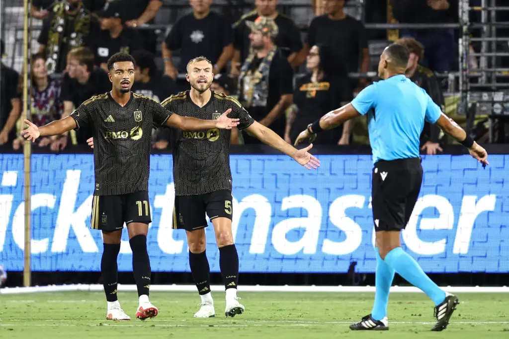 Los Angeles FC midfielder Timothy Tillman (11) and teammate forward...