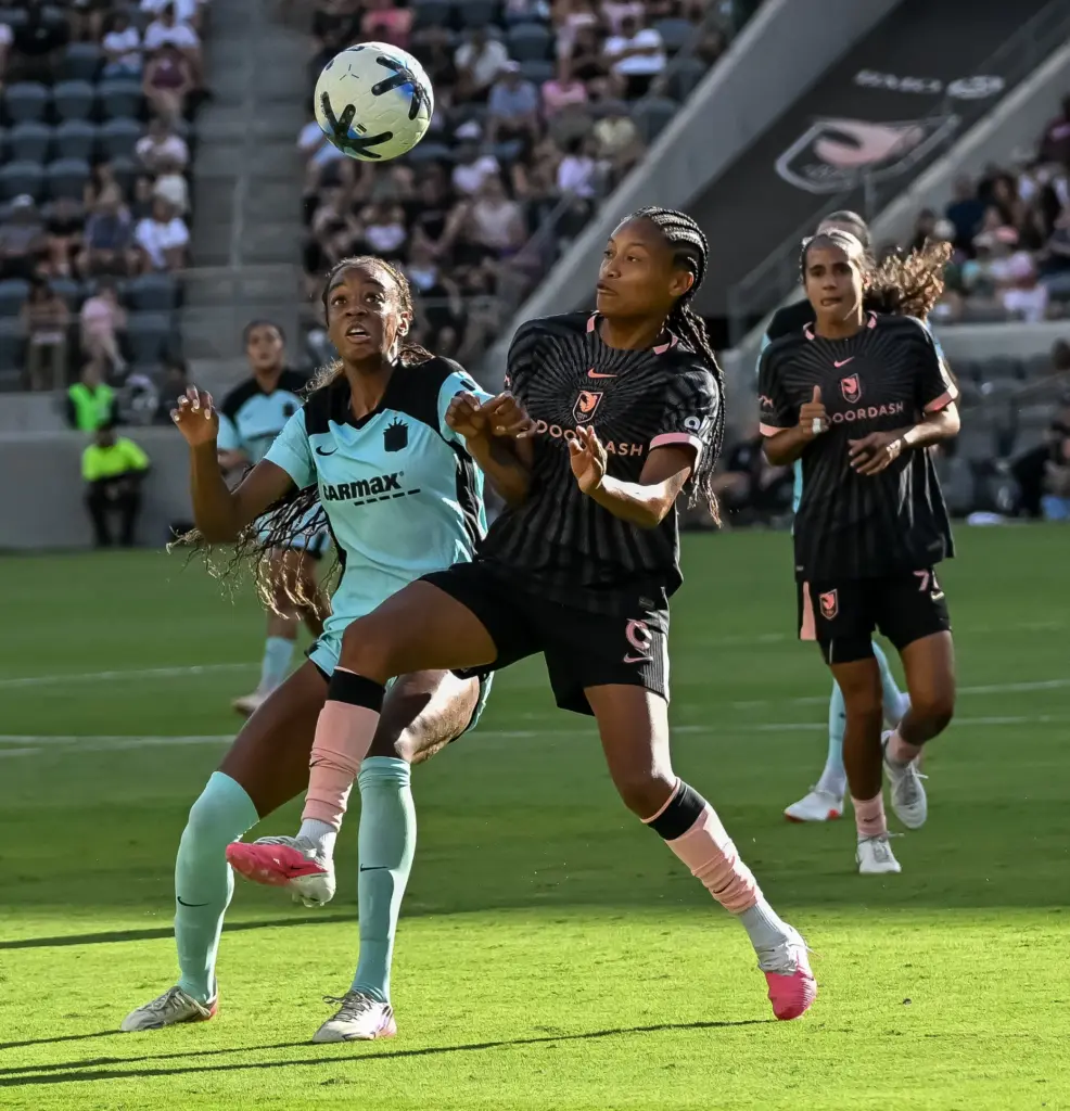 Angel City FC midfielder Ary Borges (8) battles for the...