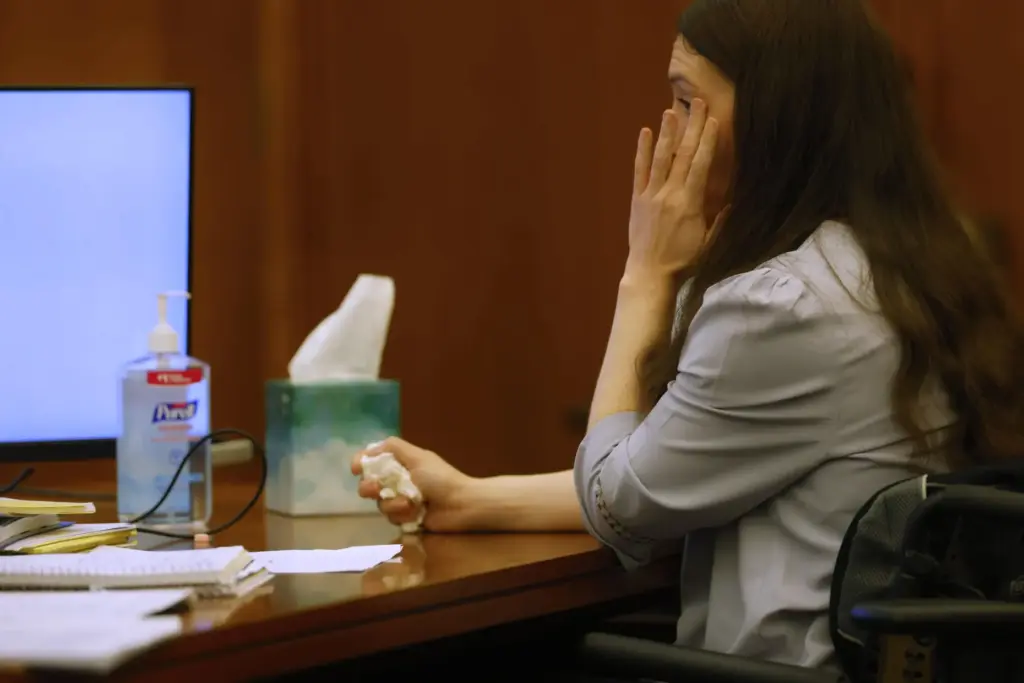 Defendant Lindsay Clancy listens during her murder trial at Plymouth Superior Court.