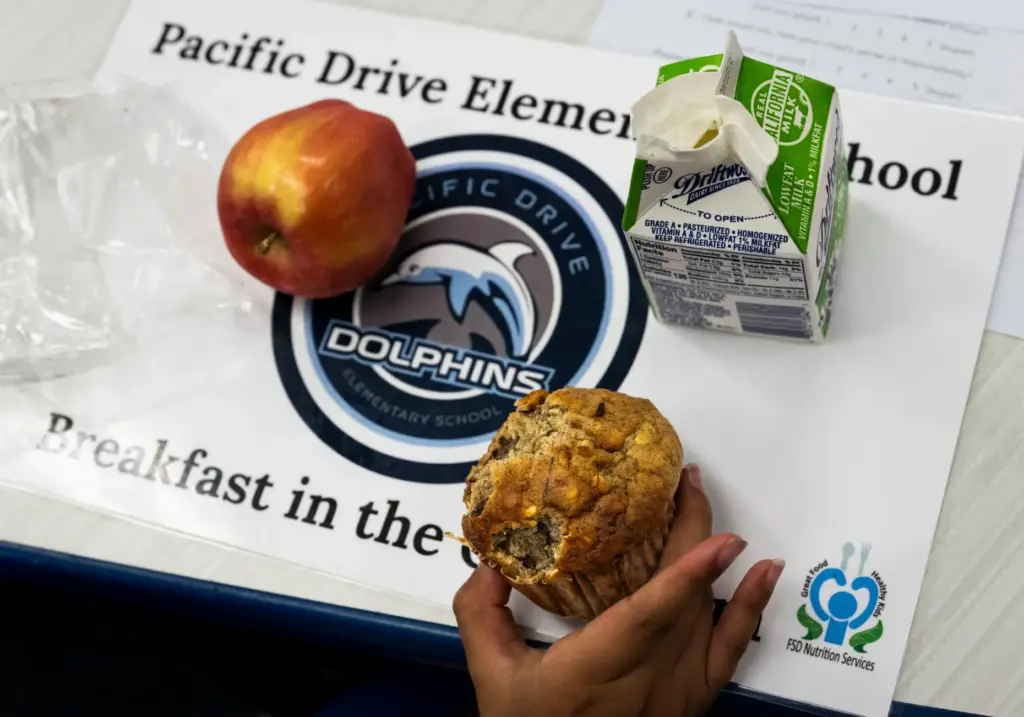 Students eat breakfast at Pacific Drive Elementary School in Fullerton...