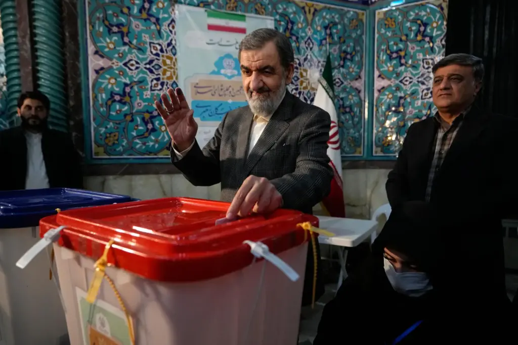 FILE – Former Revolutionary Guard commander Mohsen Rezaei casts his...