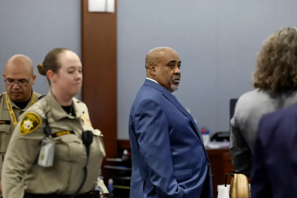 Duane Davis arrives for his trial.