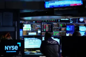 US stock futures edge higher and oil resumes ascent