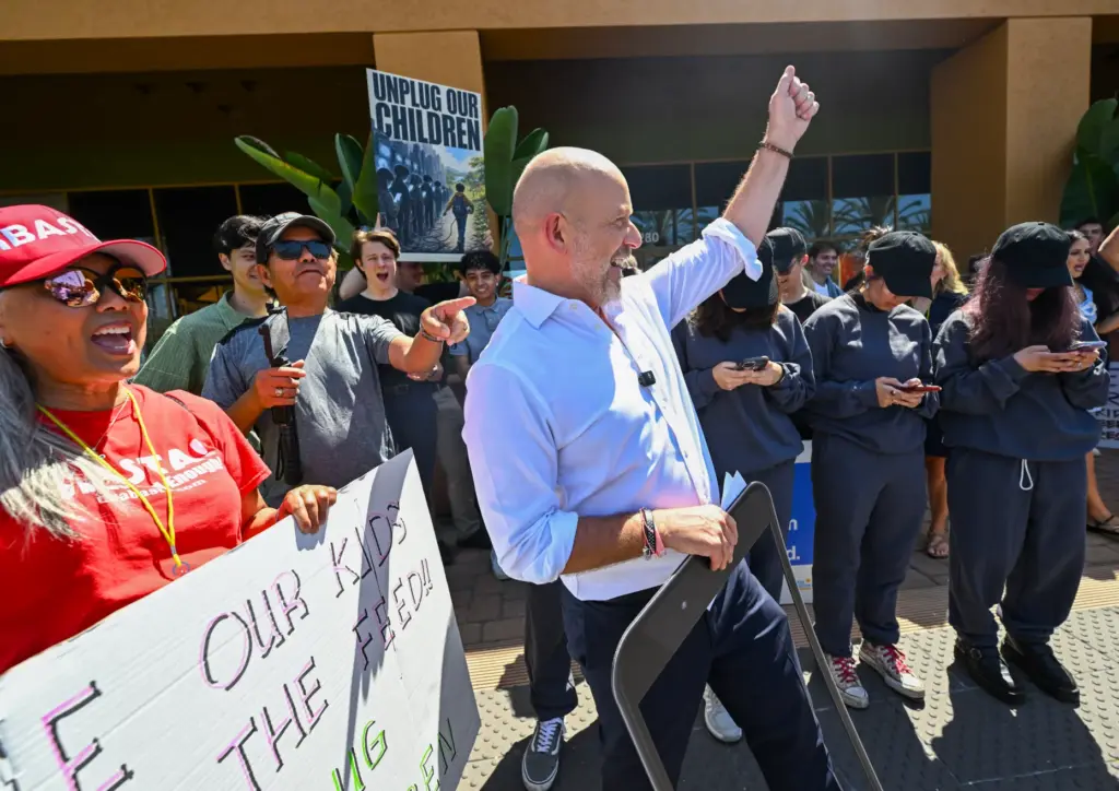California gubernatorial candidate Steve Hilton holds an outline of a...