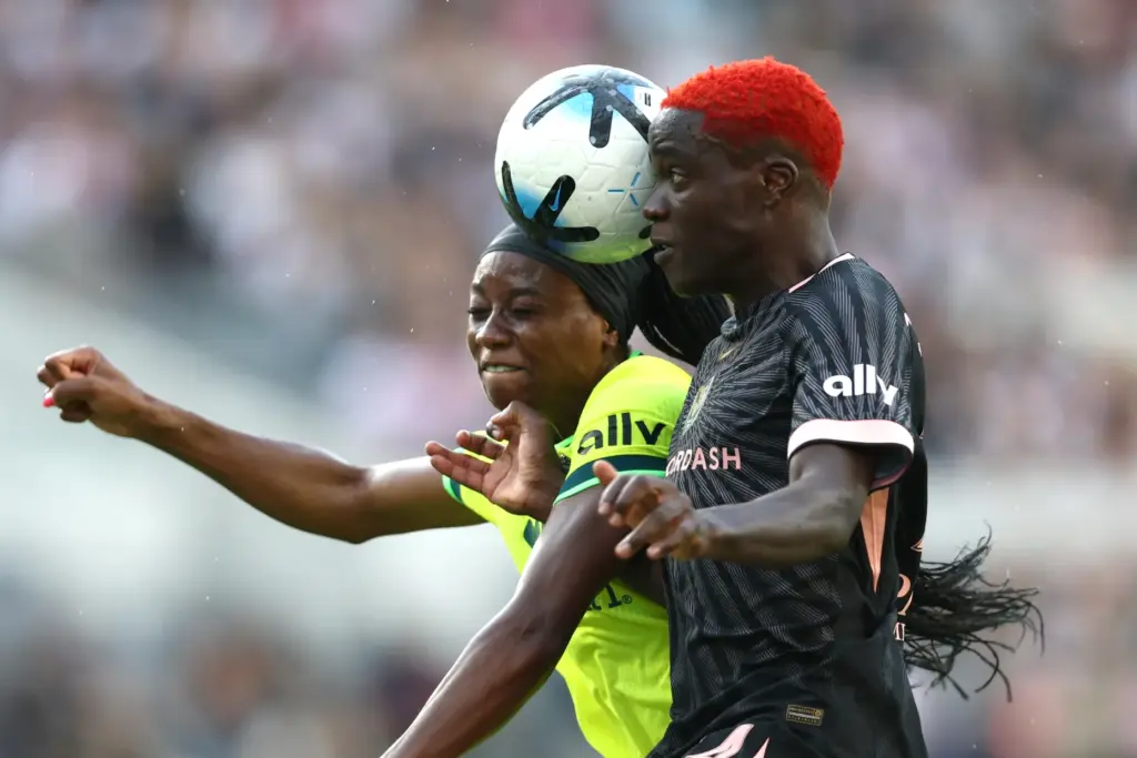 Angel City FC forward Prisca Chilufya, right, vies for the...