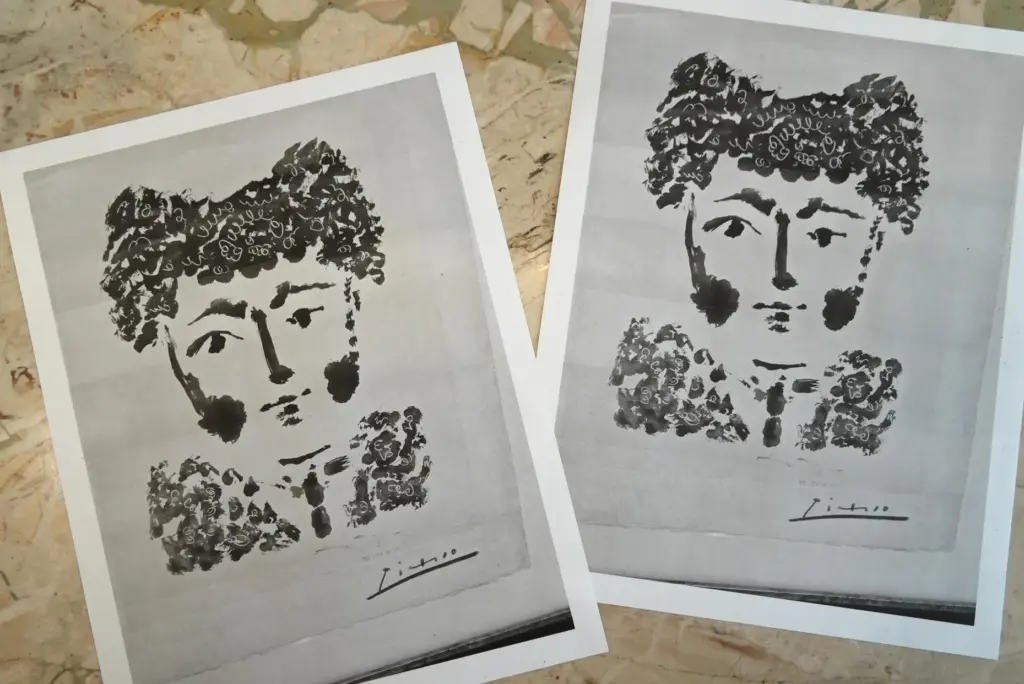 Printouts of a photo of the Pablo Picasso etching, “Torero”...