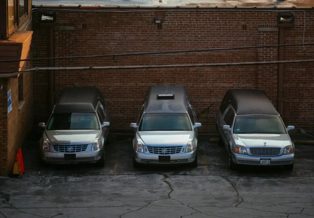 Hearses outside South Chicago Chapel where dozens of bodies were...