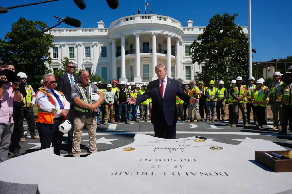 President Donald Trump speaks outside the White House, Wednesday, Aug....