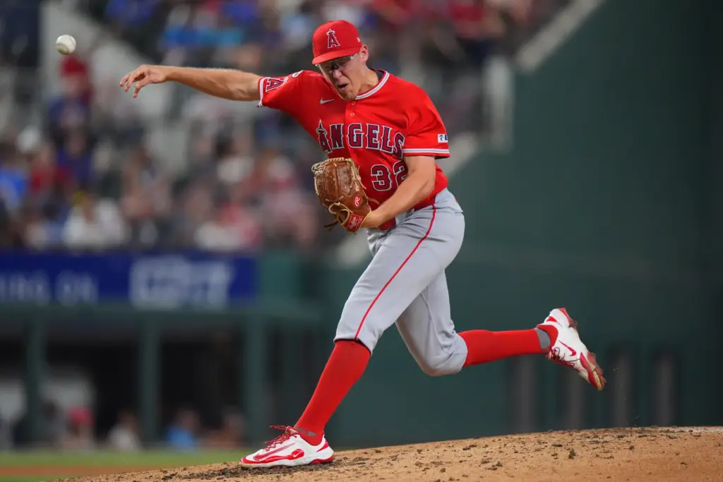Angels starting pitcher Ryan Johnson throws during the fourth inning...
