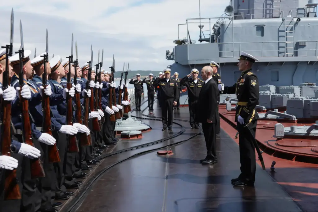 Russian President Vladimir Putin visits the Varyag missile cruiser of the Pacific Fleet.