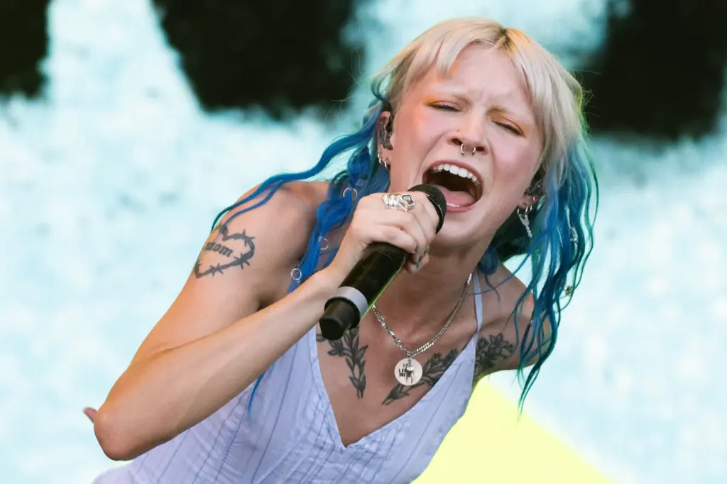 Devon Again performs during the Daisy Chain Fields music festival...