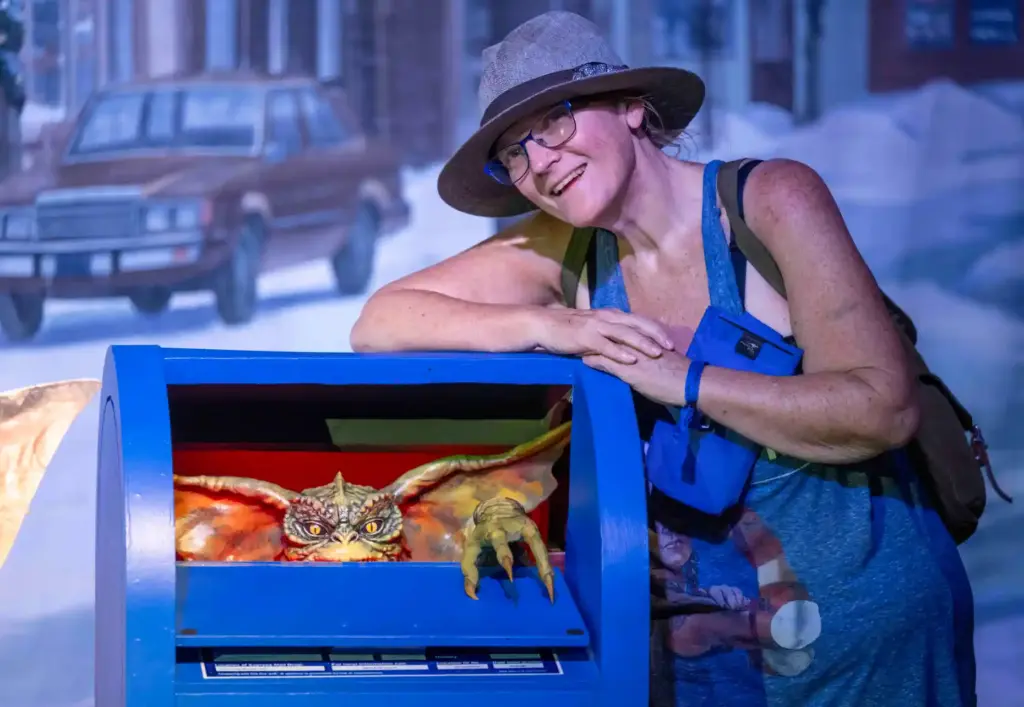 Lorie Georgeson of Anaheim stands in a Gremlins exhibit, part...