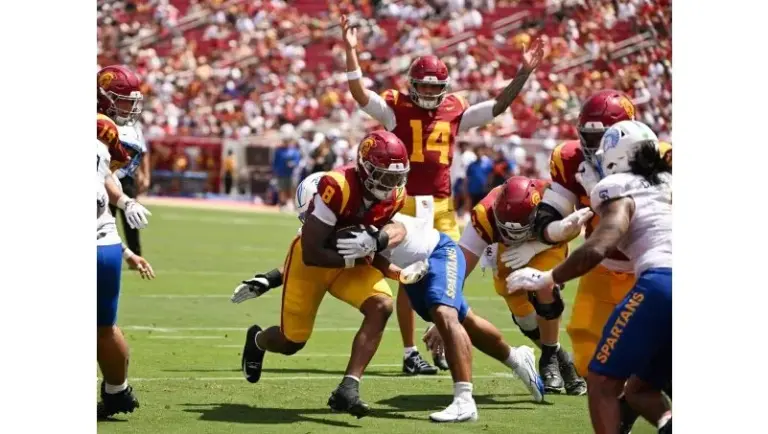 USC running back King Miller scores a second-quarter touchdown as...