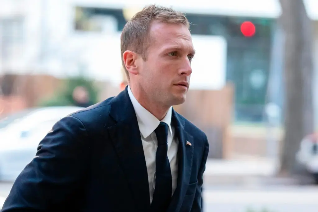 FILE – Rep.-elect Max Miller, R-Ohio, arrives for new member...