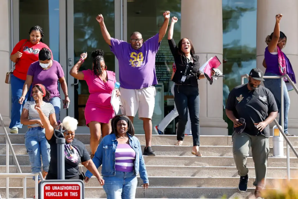 Supporters of Karmelo Anthony react after Judge John Roach Jr. was recused.