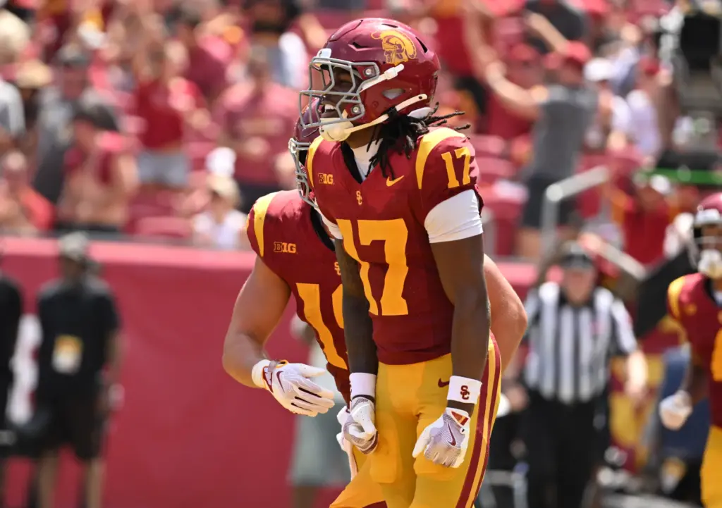 Wide receiver Kayden Dixon-Wyatt (17) of the USC Trojans reacts...