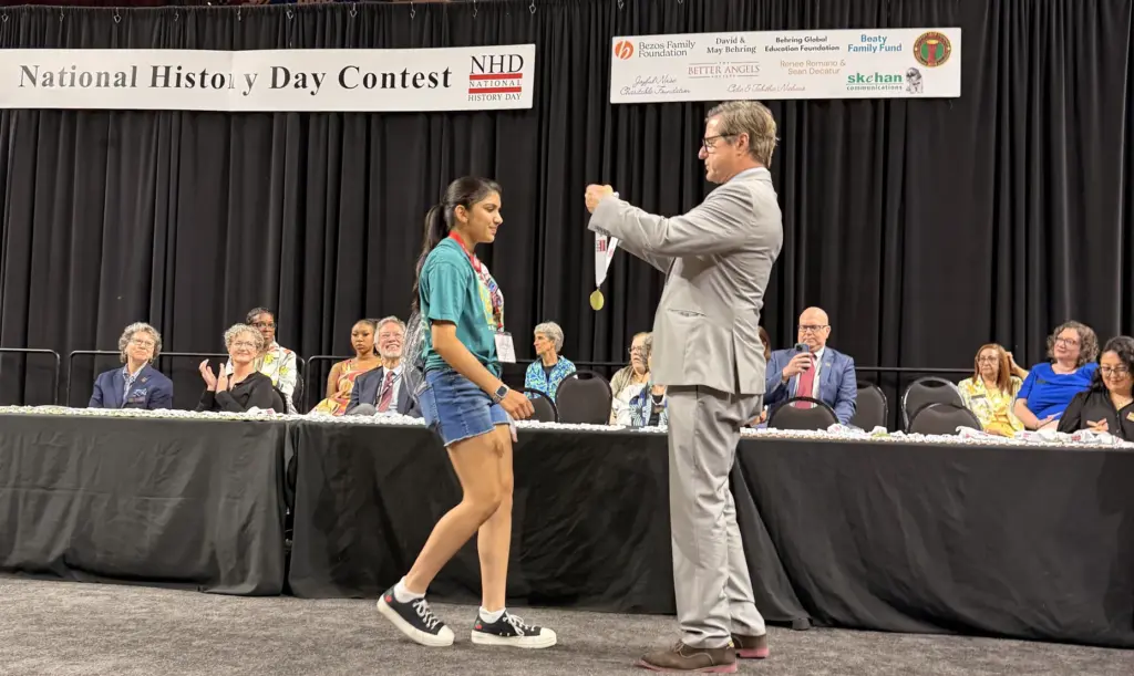 Northwood High School student Yesha Gupta receives her gold medal...