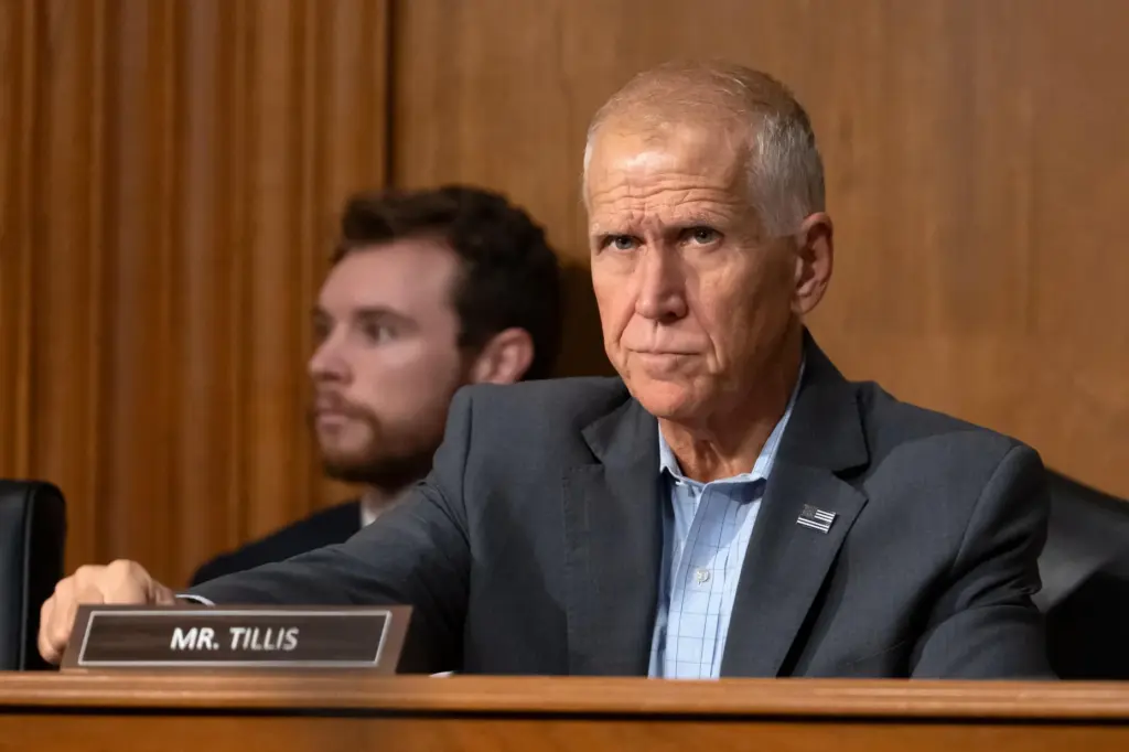 Sen. Thom Tillis, R-N.C., arrives for a hearing of the Senate Finance Committee.
