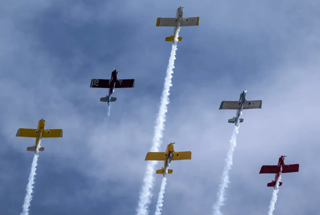 Planes fly in formation over the 122nd Huntington Beach 4th...