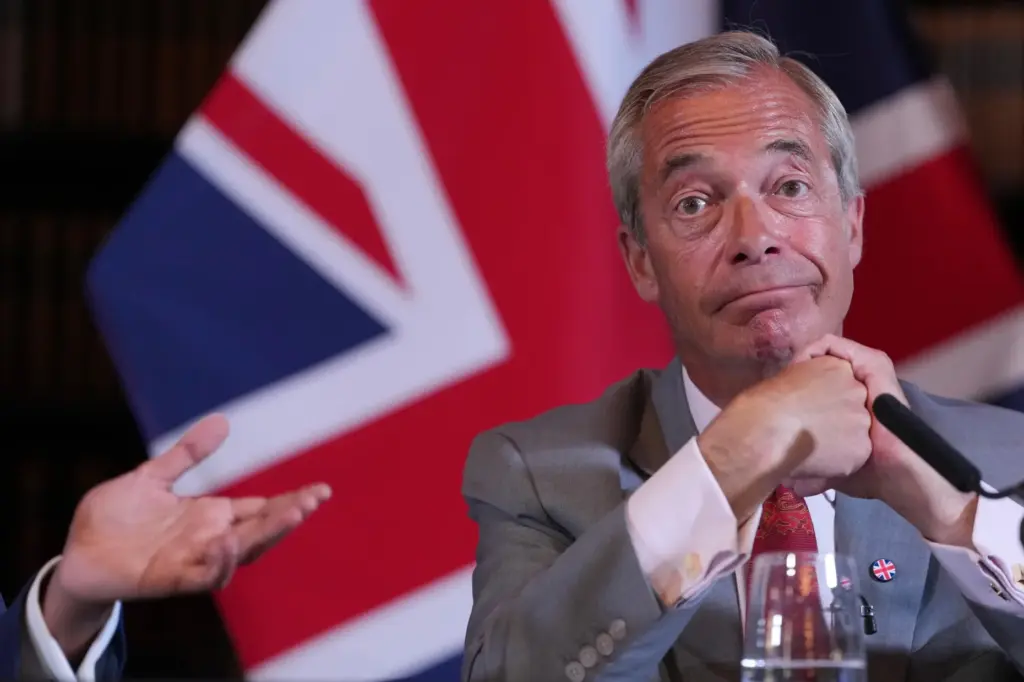 Nigel Farage, leader of Britain's Reform UK party, attends a news conference.