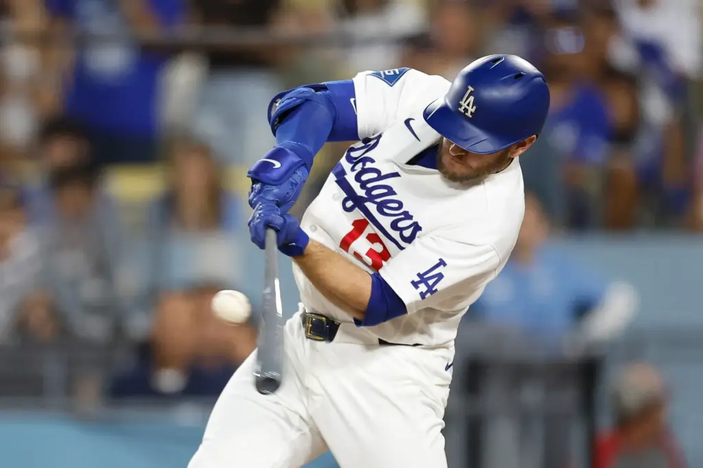 The Dodgers' Max Muncy hits a three-run double to give...