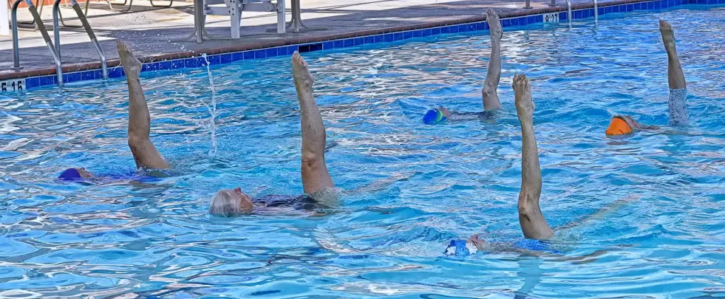 Members of the Laguna Woods Aquadettes perform a routine during...