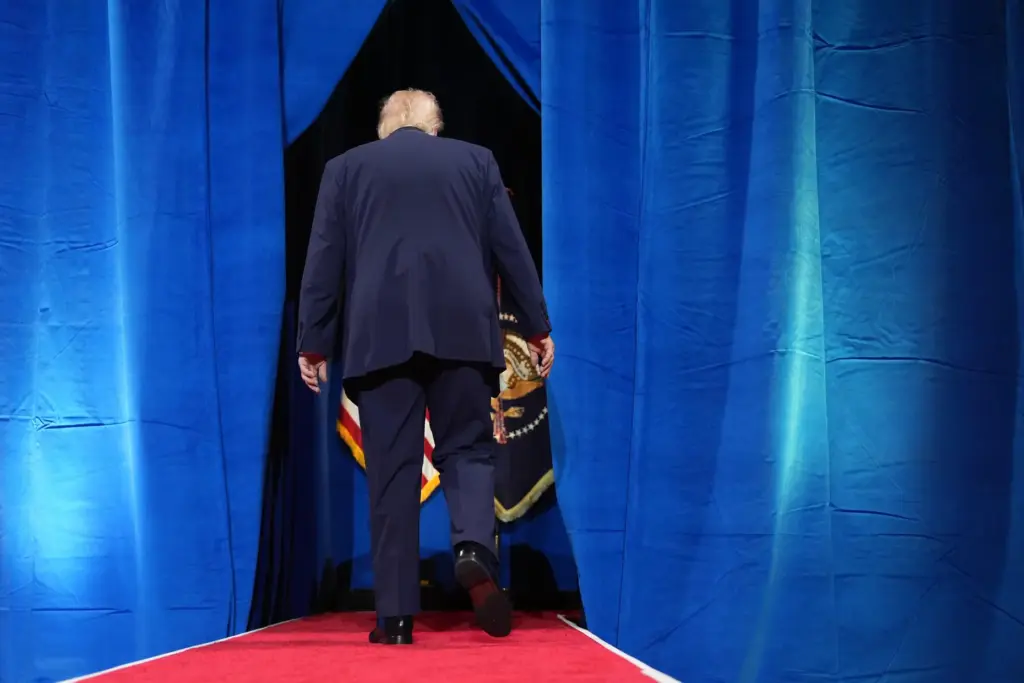 President Donald Trump departs after speaking at an event.