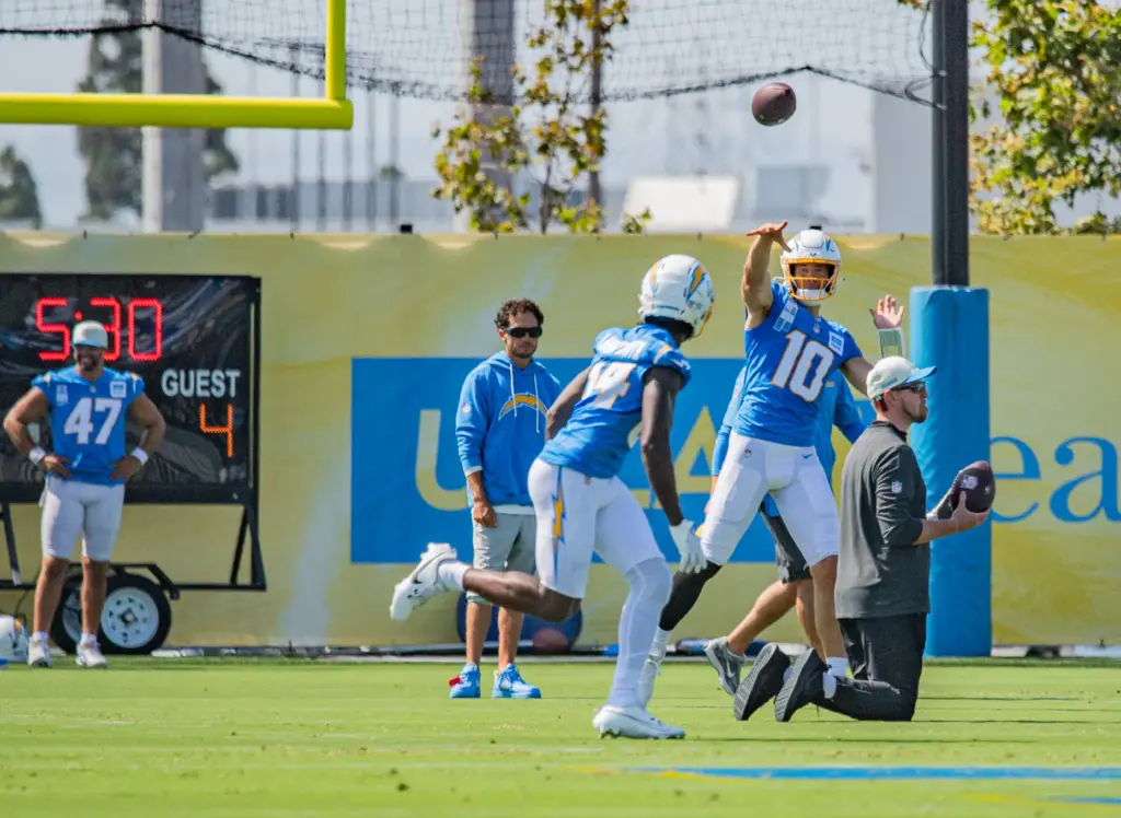 Los Angeles Chargers quarterback Justin Herbert passes over the middle...