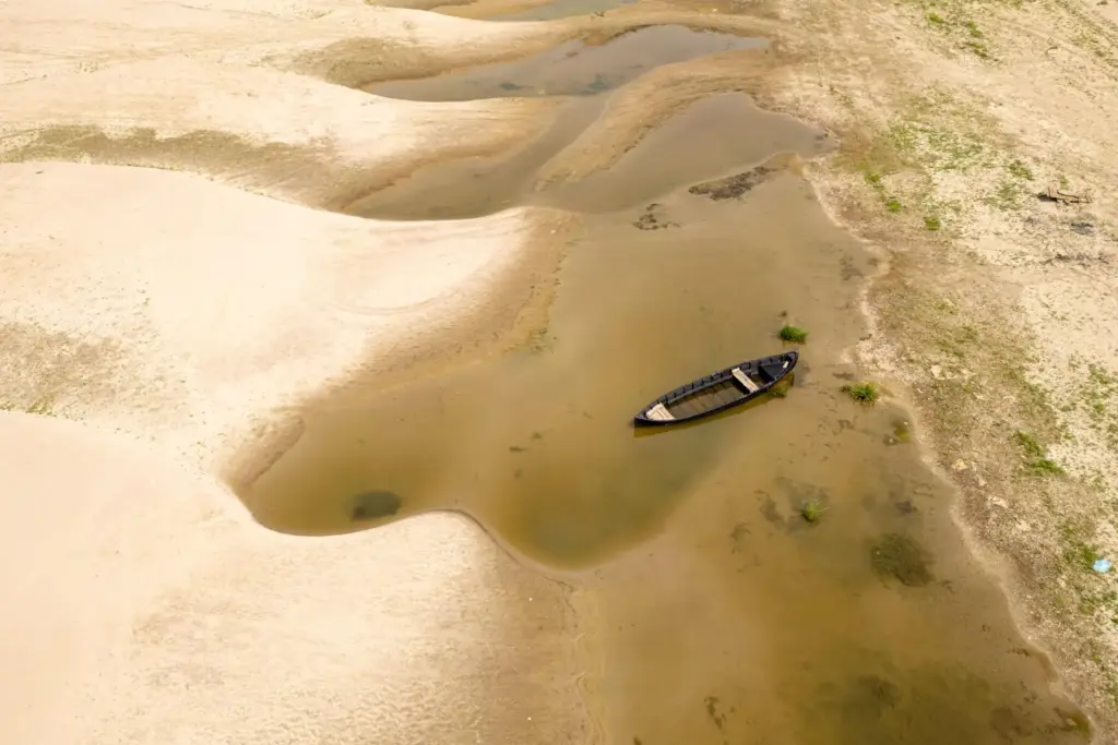 FILE – Usually submerged areas of the Danube River are...