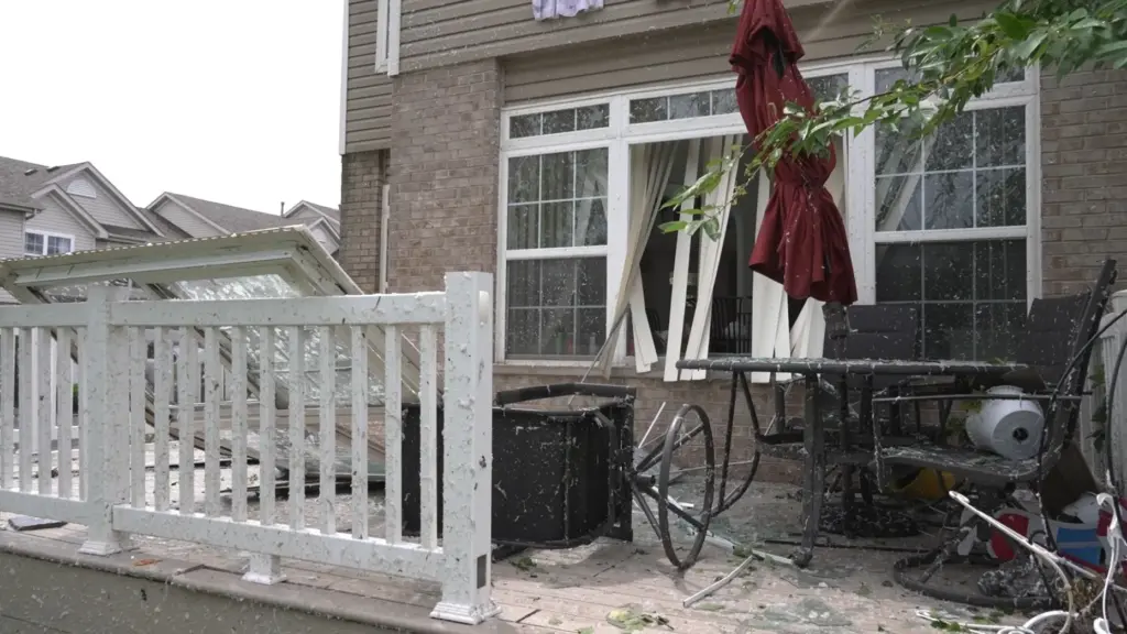 Damage caused by a strong storm is seen a home in Tinley Park, Illinois.