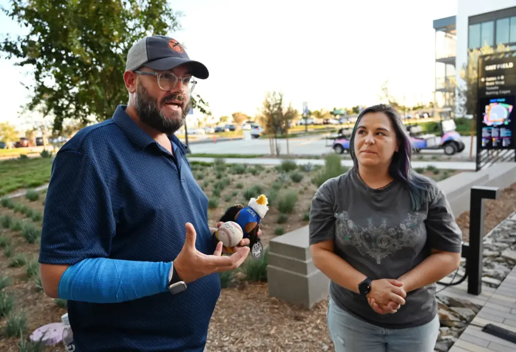 Executive director Chris Eksteen and staff veterinarian Dr. Kathryn âKatâ...