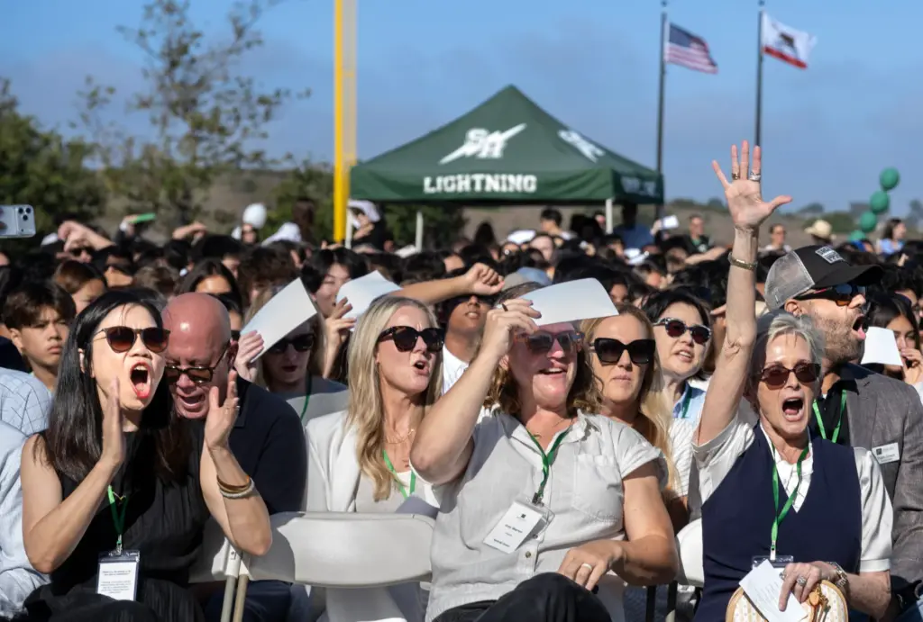An excited Sage Hill crowd participates in first-day-of-school ceremonies on...