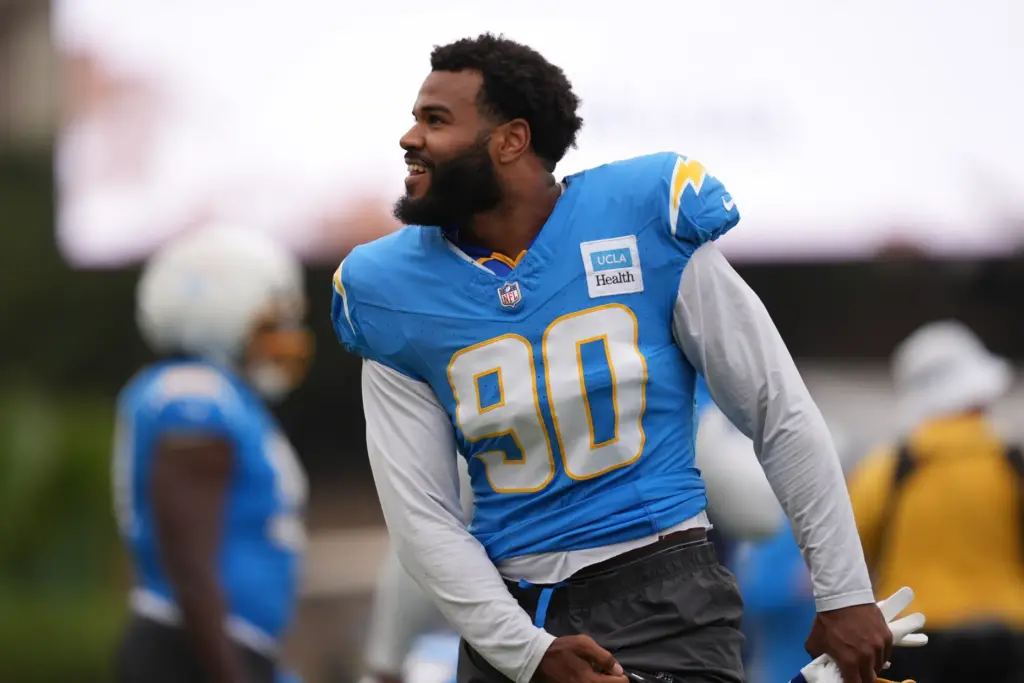 Chargers outside linebacker Akheem Mesidor smiles during an NFL football...