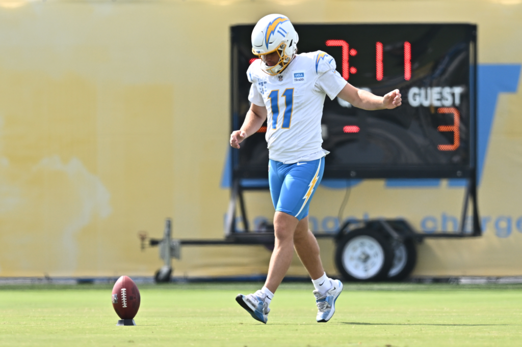 Chargers kicker Cameron Dicker works on kickoffs during a training...