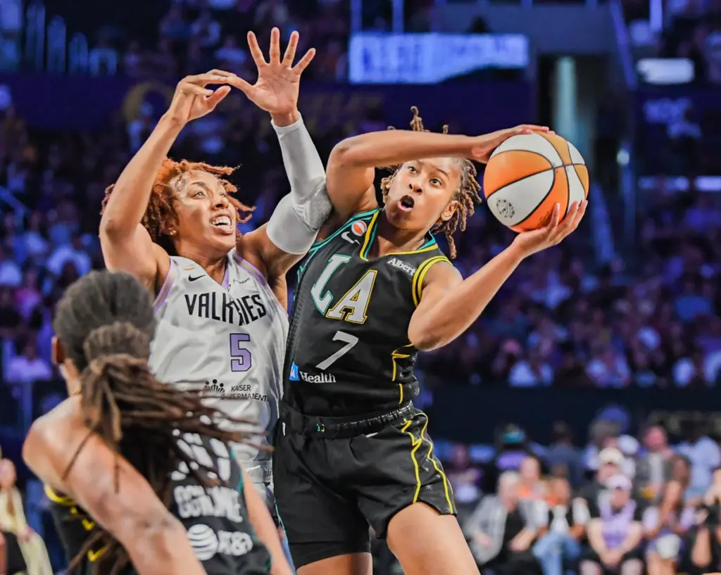 Los Angeles Sparks guard Ariel Atkins drives toward the basket...