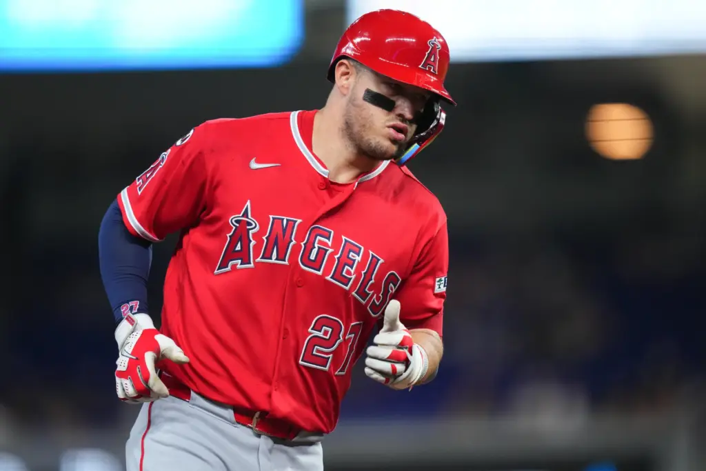 Angels star Mike Trout runs the bases after hitting a...