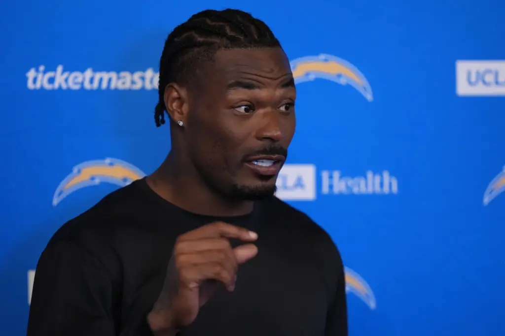 Chargers safety Derwin James Jr. gestures at a news conference...