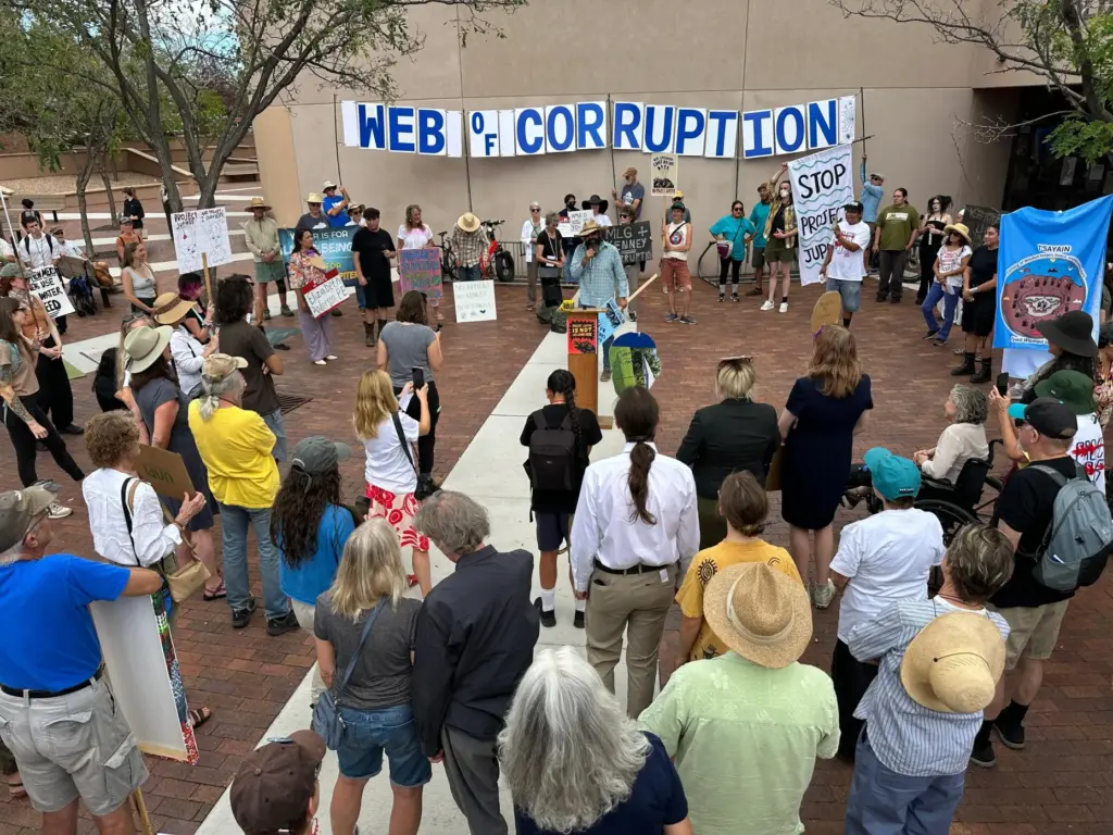 Protesters gather outside the New Mexico Environment Department to voice...